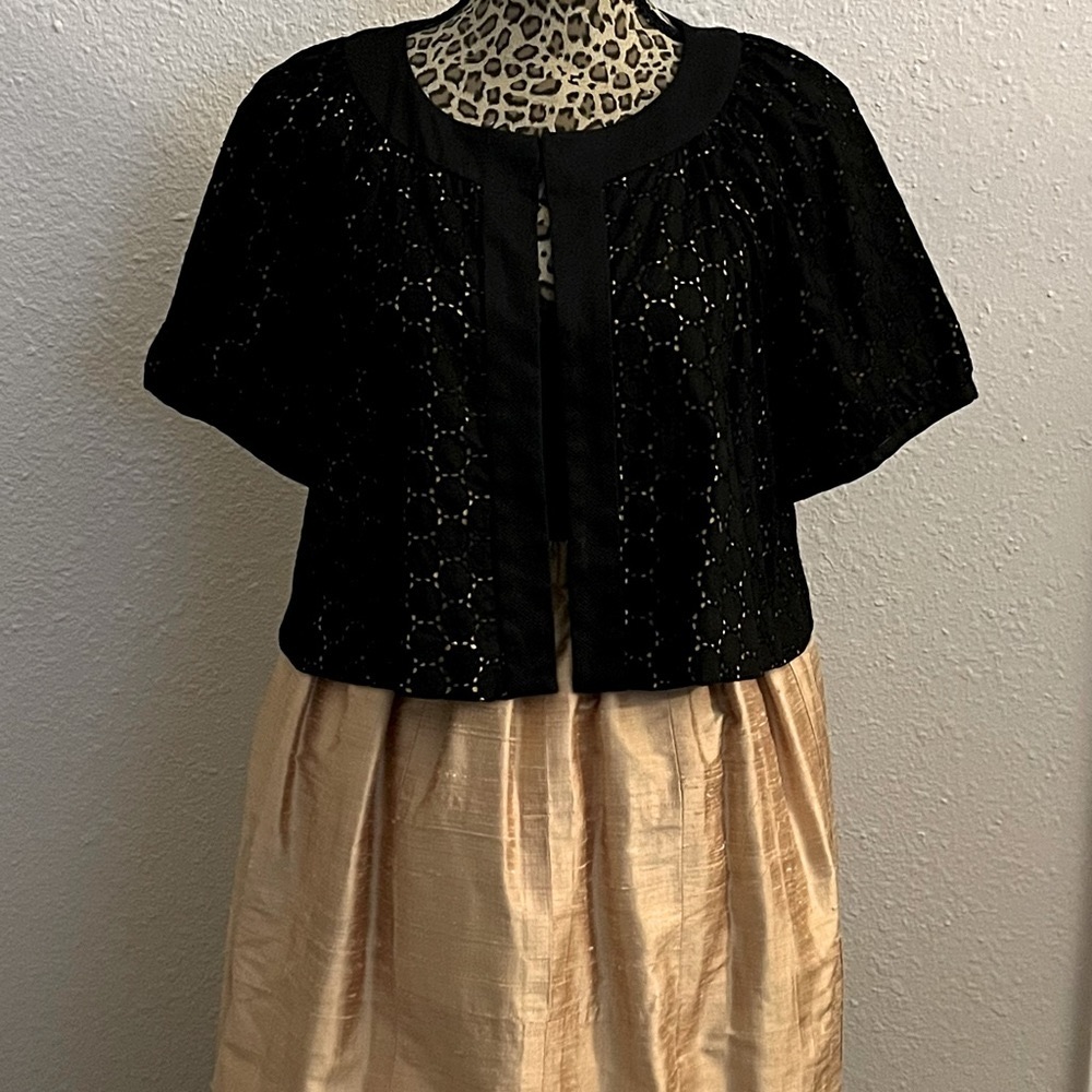 Antique Raw Silk gathered skirt crafted from individual panels, fully lined.